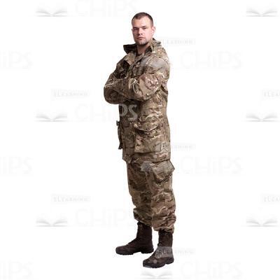 Serious Crossed Arms Standing Young Soldier In The Camouflage Cutout Photo-0