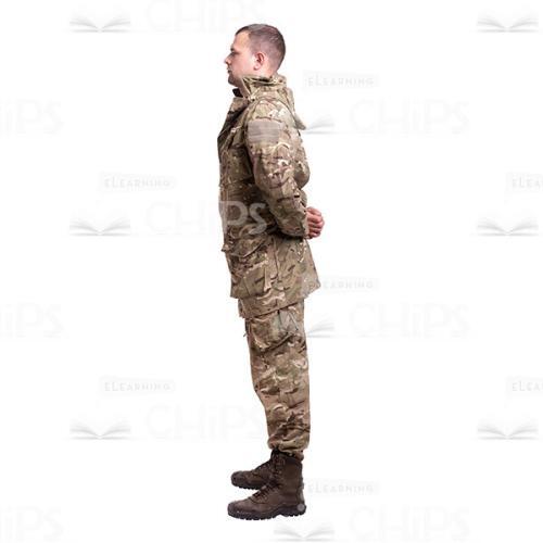 Young Soldier Standing With The Crossed Behind The Back Hands Cutout Photo-0