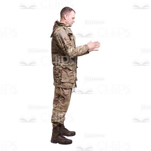 Profile View Gesticulating Young Soldier In The Camouflage Cutout Photo-0