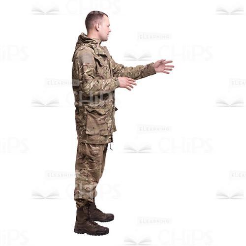 Profile View Talking And Gesticulating Young Soldier In The Camouflage Cutout Photo-0
