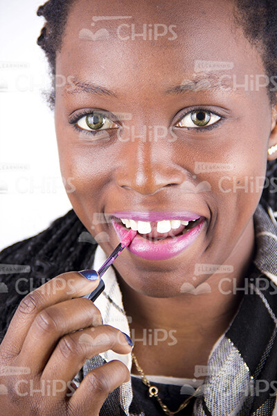 Stock Photo Of Nice African Woman Using Lip Brush-0