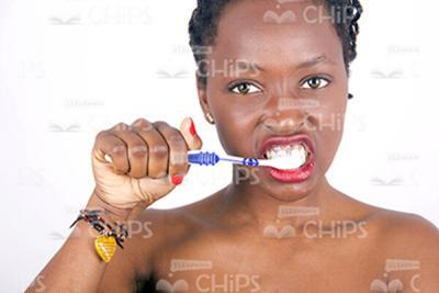African Woman Brushing Her Teeth Stock Photo-0