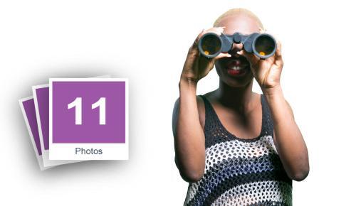 Woman Looking Through Binoculars Stock Photo Pack-0