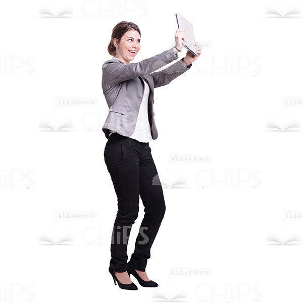 Excited Businesswoman Holding Tablet In Front Of Her Cutout-0