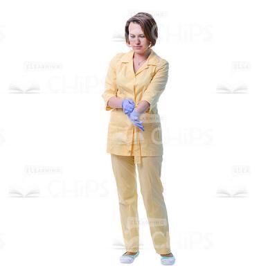 Female Therapist Putting On Blue Medical Gloves Cutout Image-0