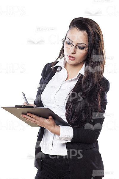 Pretty Young Businesswoman Making Notes Stock Photo-0