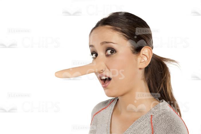 Open-Eyed Young Woman With Long Nose Stock Photo-0