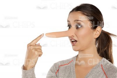 Young Woman Touching Her Elongated Nose Stock Image-0