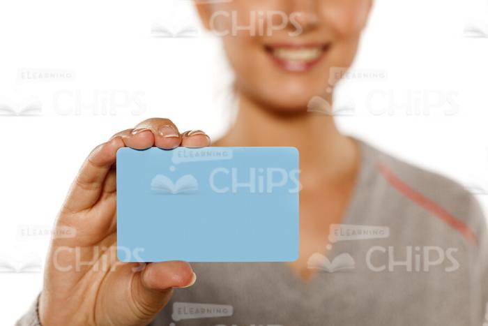 Woman Holding Card Sample Close Up Stock Photo-0