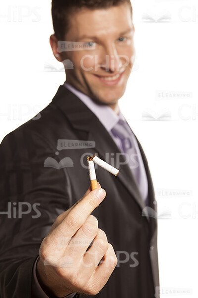 Business Man Breaking Cigarette Stock Photo Pack-31836