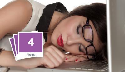 Tired Business Girl At Her Workplace Stock Photo Pack-0