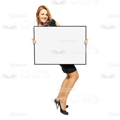 Excited Young Lady Holding White Poster Cutout Photo-0
