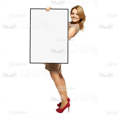 Smiling Businesswoman With Board Standing Sideways Cutout Image-0
