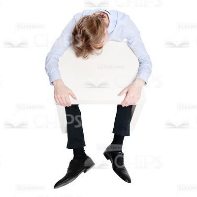 Young Man Sleeping Behind The Small Table Cutout Image-0