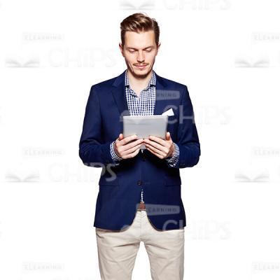 Cutout Picture of Handsome Young Man in Dark Blue Suit Looking at the Tablet -0