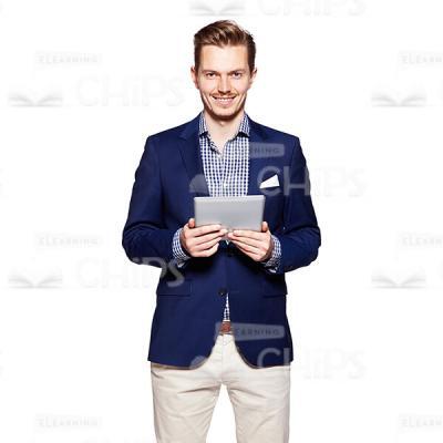 Cutout Picture of Smiling Young Man in Dark Blue Suit Holding a Tablet and Looking at the Camera-0