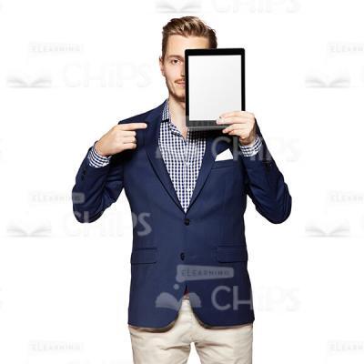 Cutout Photo of a Serious Young Man in Dark Blue Suit Covering Part of His Face with the Tablet -0