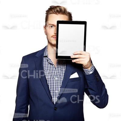 Cutout Photo of a Strict Young Man in Dark Blue Suit Hiding Behind the Tablet-0