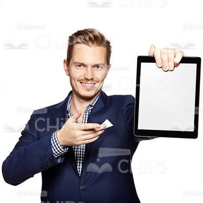 Smiling Businessman Presenting And Pointing At Tablet Cutout Photo-0