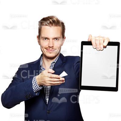 Smiling Young Man Presenting And Pointing At Tablet Cutout Photo-0