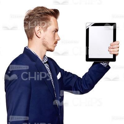 Profile View Standing Young Man Presenting Tablet Cutout Photo-0