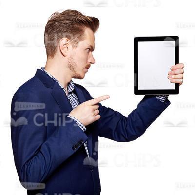 Profile View Standing Young Man Presenting And Pointing At Tablet Cutout Photo-0