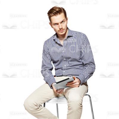 Frowned Young Man Holding Tablet Cutout Photo-0