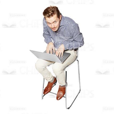 Typing Young Man Looking At Camera Cutout Photo-0