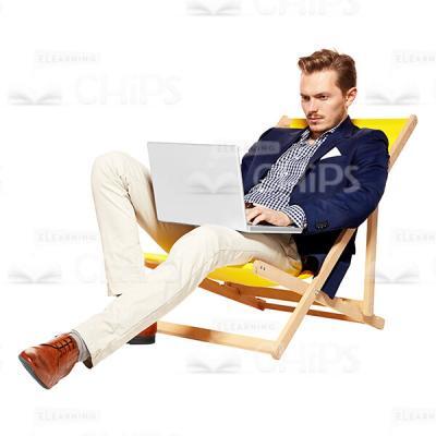 Nice Man With Laptop Sitting On Lounge Chair Cutout Image-0