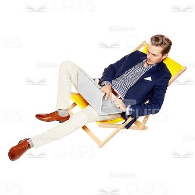 Relaxed Businessman Working On Laptop Cutout Image-0