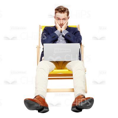 Astonished Businessman With Laptop Sitting Cutout Picture-0