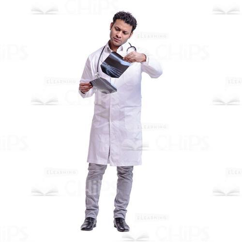 Cutout Picture of Young Doctor Examining X-Ray-0