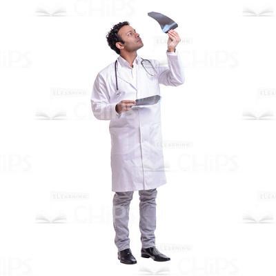 Cutout Picture of Young Doctor Examining X-Ray in the Light-0