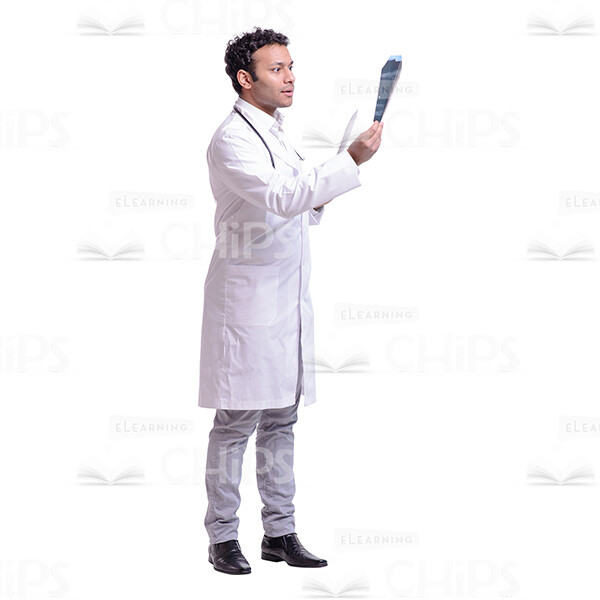 Cutout Image of Fascinated Doctor Looking at X-Ray in the Light-0