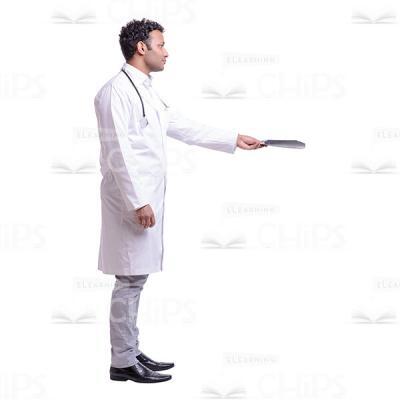Cutout Photo of Handsome Young Doctor Standing Sideways and Giving X-rays to Someone-0