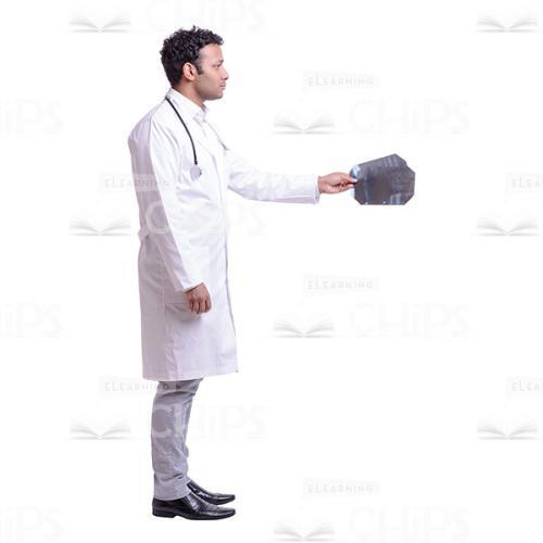 Cutout Image of Serious Doctor Giving Two X-rays to Someone-0