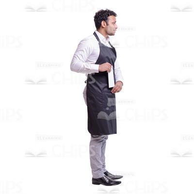 Cutout Image of Handsome Waiter Standing Half Turned and Putting a Notepad in His Pocket-0