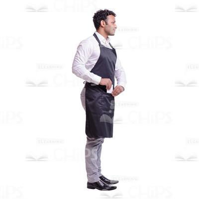 Cutout Picture of Handsome Waiter Standing Half Turned and Hiding a Notepad in His Pocket-0