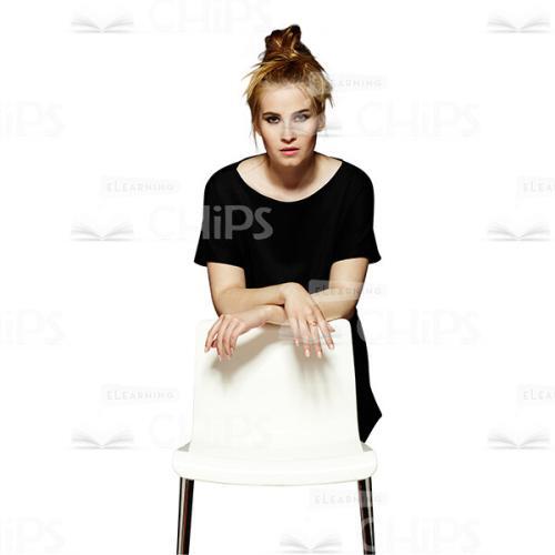 Handsome Female Teenager Leaning On Back Of Chair Cutout-0