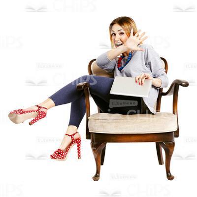 Young Woman With Tablet Sitting With Defensively Raised Hand Cutout Image-0