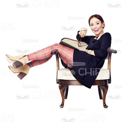 Cutout Image of Laughing Young Woman Lying in an Armchiar-0