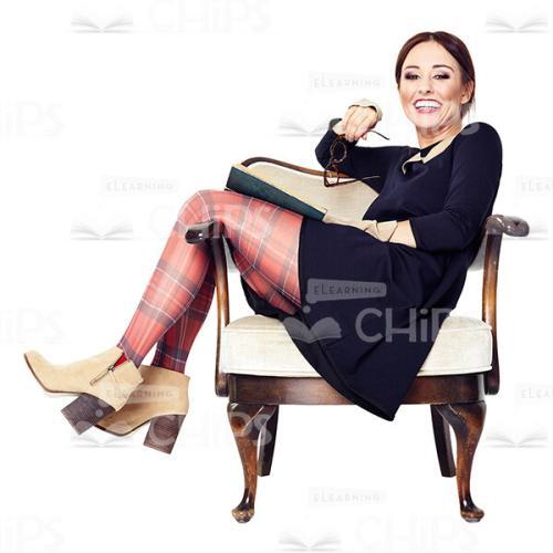 Cutout Image of Laughing Young Woman Lolling in an Armchiar with a Book-0
