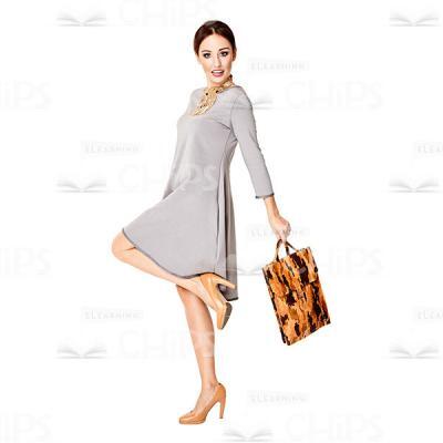 Cutout Character of a Pretty Young Woman in a Grey Dress with One of Her Knees Bent-0