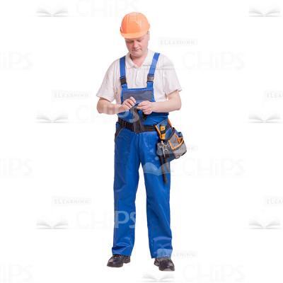Cutout Picture of Focused Constructor in Orange Hard Hat Pulled out Work Gloves-0