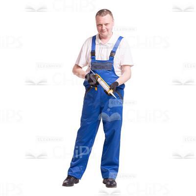 Cutout Image of Happy Worker with Construction Sealant Charged into Syringe Gun-0