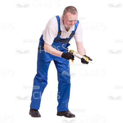 Mid-Aged Worker With Building Syringe Gun Leaning Forward Cutout Image-0