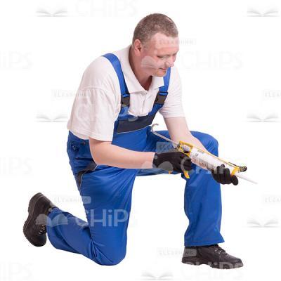 Cutout Middle-aged Worker Crouching And Using Syringe Gun-0