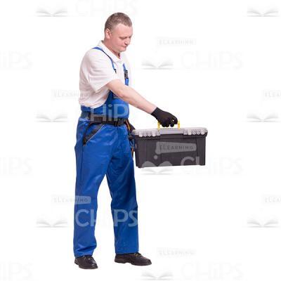 Middle-aged Builder Transmitting a Toolbox to Someone Cutout Photo-0