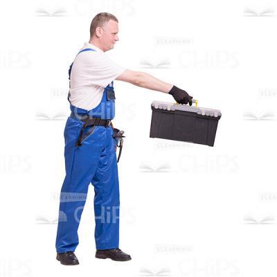 Cutout Image of Mid-Aged Worker Standing Sideways and Handing out His Tool Box-0