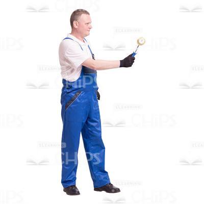 Cutout Photo of Middle-aged Worker Standing Sideways and Painting the Wall-0